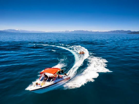 Wakeboard Boat on Lake Tahoe with tube