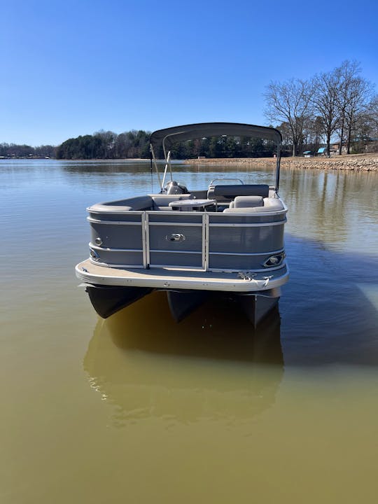 Enjoy a beautiful day on Lake Norman with a 23ft Luxury Tri-toon and free tube!