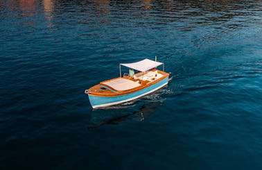 Portofino's Jewel: Cruise in Style with Our Ginca Classic Boat