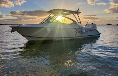 Navigate your way to fun with us onboard 27ft Pursuit Dual Console Boat!