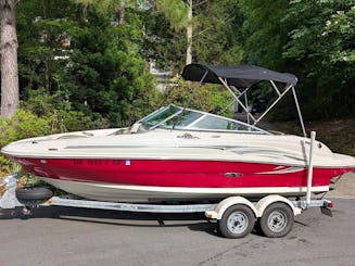 Enjoy the day out on the water, aboard a 21-foot power boat!