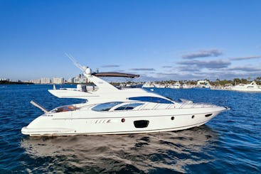 ¡HORA GRATIS EN UN AZIMUT FLY BRIDGE DE 65 PIES, 1 MOTO ACUÁTICA INCLUIDA Y 1 HORA GRATIS!