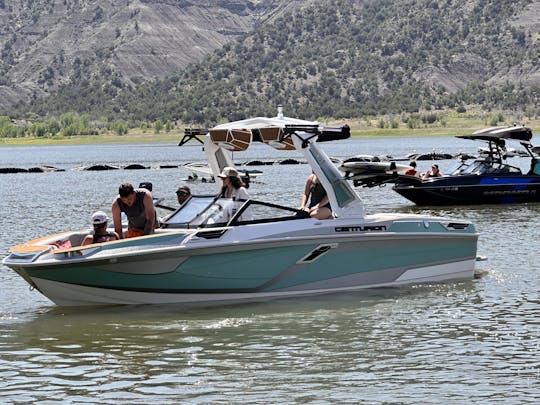 Centurion Ri 245 Surf Boat on Navajo Lake and Lake Night Horse