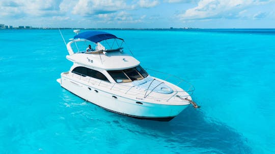 FUN 46 pés. Iate Meridian Flybridge em CANCÚN, 1 HORA DE JETSKI GRÁTIS