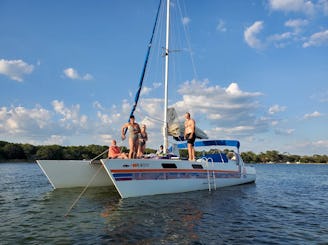 Aventure relaxante en catamaran : plongée avec tuba, voile, dauphins