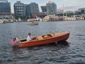 A Romantic Vintage 1954 Wooden Boat Escape in the Heart of Washington, D.C.