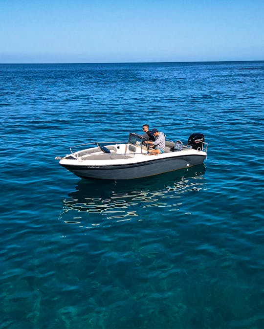 Rent  the Karel Open boat and cruise Skiathos island  with your family