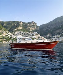 Explore the Amalfi Coast on a classic boat