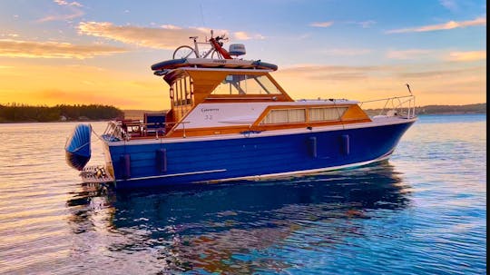 Classic Wooden 35ft Cruiser, perfect for a sunset champagne cruise! 