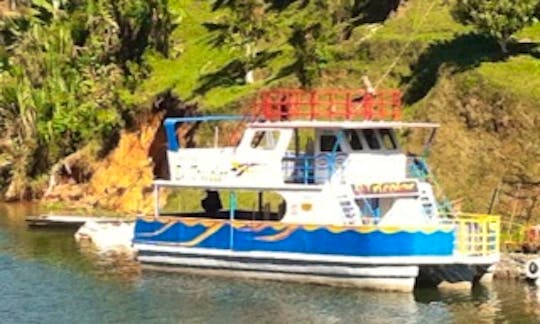Charter 33' Passenger Boat In El Peñol, Colombia for up to 20 to 100 people