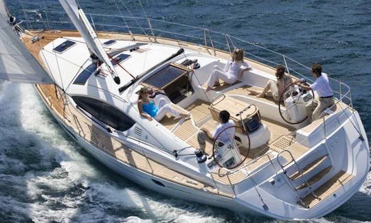 Enjoy the Sun Odyssey 54 Sailing Yacht Charter in Athens, Greece