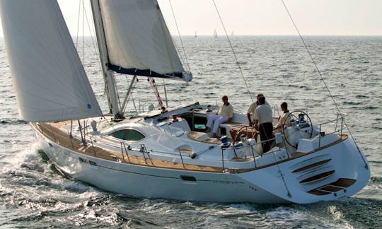 Enjoy the Sun Odyssey 54 Sailing Yacht Charter in Athens, Greece