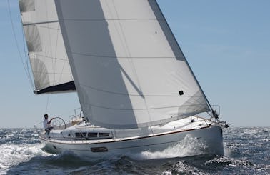 Explore the Mediterranean on a 44' Sun Odyssey Bareboat Sailing Charter in Alimos, Greece