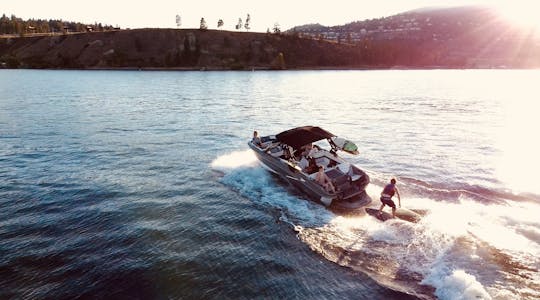 Brand New Wakeboat with boards and tubes 