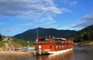 Cruise Laos Waterways aboard a Wooden River Vessel for 28 Person!