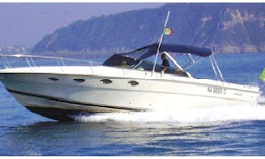 Cruise on this "Tornado 38" rental in Ischia, Italy