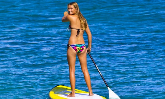 Stand Up Paddleboard Lessons and Rentals in Li Junchi, Italy