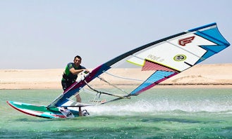 Windsurf Lessons and Rentals in Li Junchi, Italy