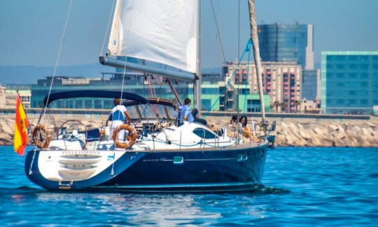 Luxury Jeanneau Sun Odyssey 54 DS Sailing Yacht with Blue Hull and Blue Deck in Barcelona, Catalunya