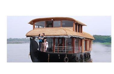 Cruise the Kerala Backwater Waterways aboard a Houseboat for 4 People