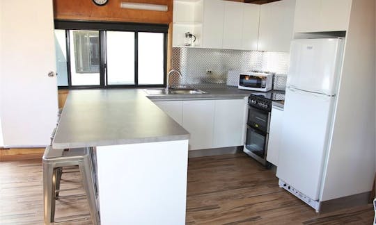 This kitchen has room for everyone, complete with large gas oven, grill and gas hobs