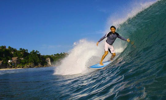 Learn to surf in Teluk Dalam with our professional coaches!