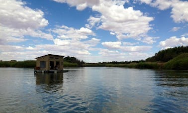 Sleep aboard this Houseboat on the majestic Orange River for R1500 per night, in Upington.