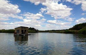Sleep aboard this Houseboat on the majestic Orange River for R1500 per night, in Upington.