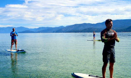 Stand steady on Lake Tahoe during our Paddle Yoga sessions.