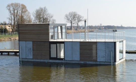 Stay on Houseboat HT7 XXL with 3 Bedrooms and Sauna in Mielno, Poland