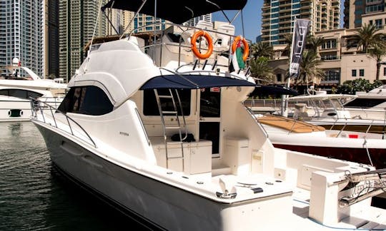 Alugue um iate a motor Riviera Flybridge de 47 pés em Dubai, Emirados Árabes Unidos