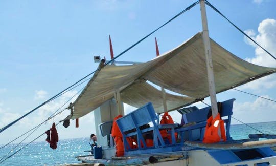 Charter a Traditional Pinoy Boat to Cruise the Mindoro Strait, Philippines