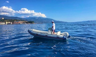 Rent a Semi-Rigid Inflatable Boat for 4 People in Senj