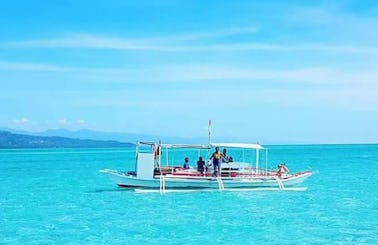 Traditional Paraw Boat Tours in Bais City, Philippines