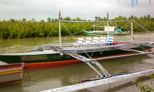 Charter a Traditional Boat in Daet, Philippines