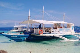 'DevOcean' Outrigger Boat Diving Trips in Bounty Beach