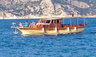 Traditional 12-person Motor Yacht ready to take you out on the waters of Muğla, Turkey