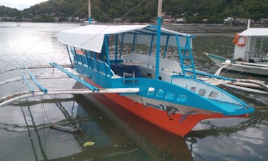 Hop On Board Our Paraw traditional boat of the region in Bais City, Philippines