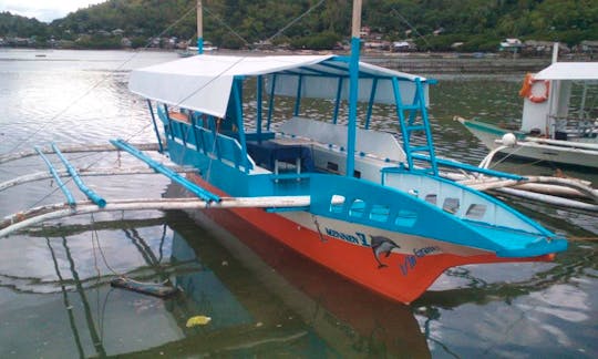 Hop On Board Our Paraw traditional boat of the region in Bais City, Philippines