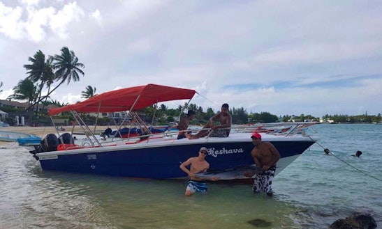 Enjoy Fishing In Grand Baie, Mauritius On Center Console