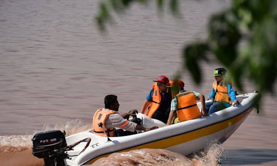 Rent a small 4 person outboard boat in Punjab, Pakistan