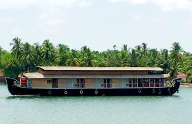Charter Lacosta Houseboat in Thaikadappuram, Kerala India