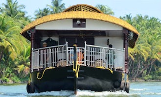 Charter Honey Dew Houseboat in Thaikadappuram, Kerala, India