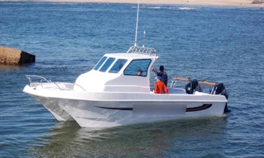 Disfrute de la pesca en Swakopmund, Namibia, en un catamarán a motor de 29 pies