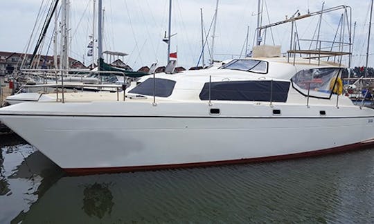 Extreme popper and jigging fishing Lazarus Banks Mozambique on 42' Power Catamaran