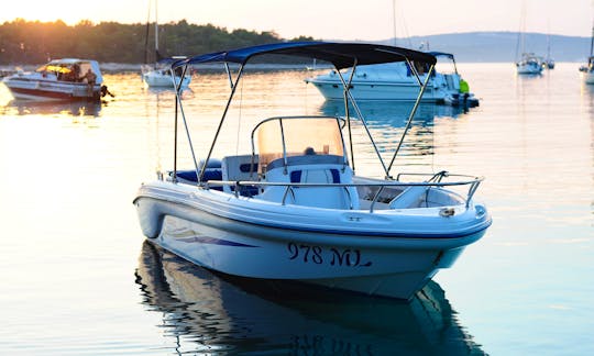 Hit the water with this Ranieri Soverato Deck Boat rental in Mali Lošinj, Croatia