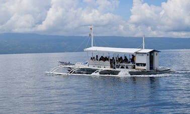 Charter a 20 Person Pontoon in Bais City, Philippines