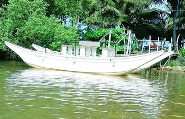 Rent a Traditional Paddle Boat in Galle, Sri Lanka