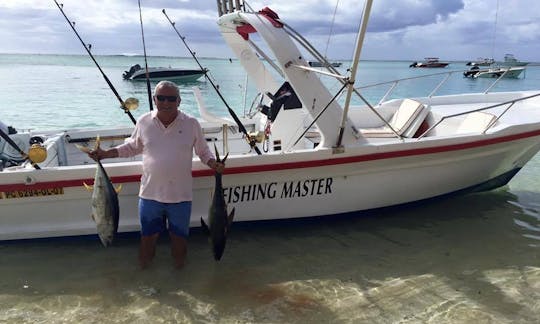 Enjoy Fishing in La Gaulette, Mauritius on Center Console