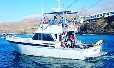 Viaje de pesca en Teguise, España, en un pescador deportivo